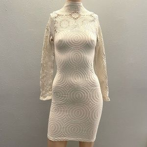 Bebe style long sleeve Bodycon with laser cut detailing and turtleneck